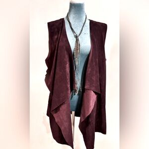 Calvin Klein Vest in size SM but is more of a one size fits most.